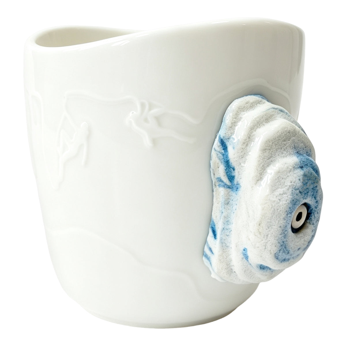 White ceramic rock climbing mug with a 3D blue-speckled climbing hold handle and decorative bolt detail