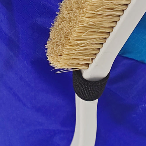 Includes an integrated slot for a climbing brush, keeping it easily accessible.
