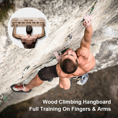 Climber training at home using wooden fingerboard hangboard for grip strength and endurance